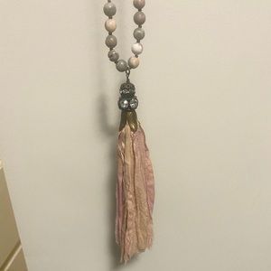 Long necklace with blush pink fabric fringe tassel